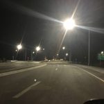a traffic circle with terrible white LED lights